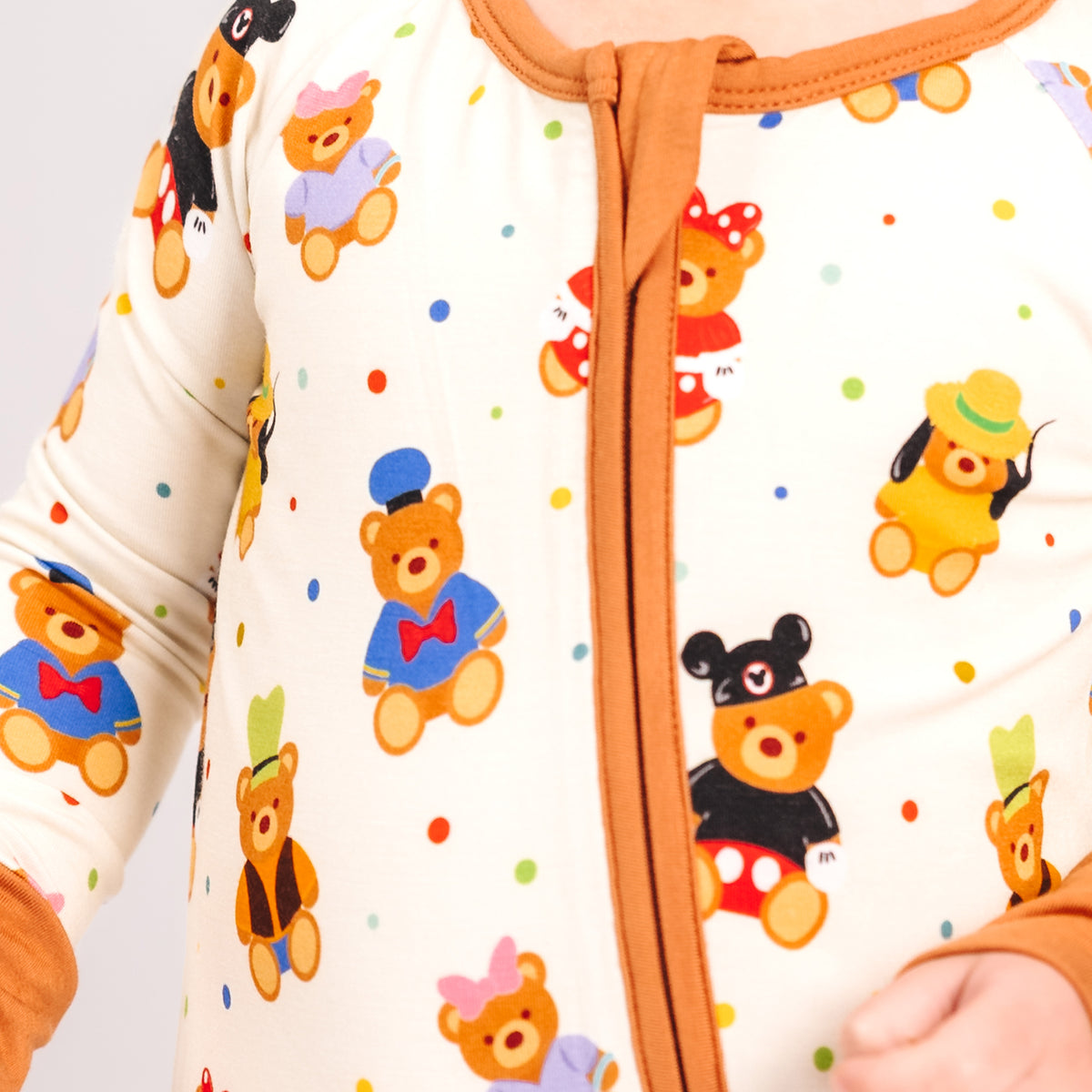 Close-up of the 2-way zipper on the Main Street Bears convertible romper