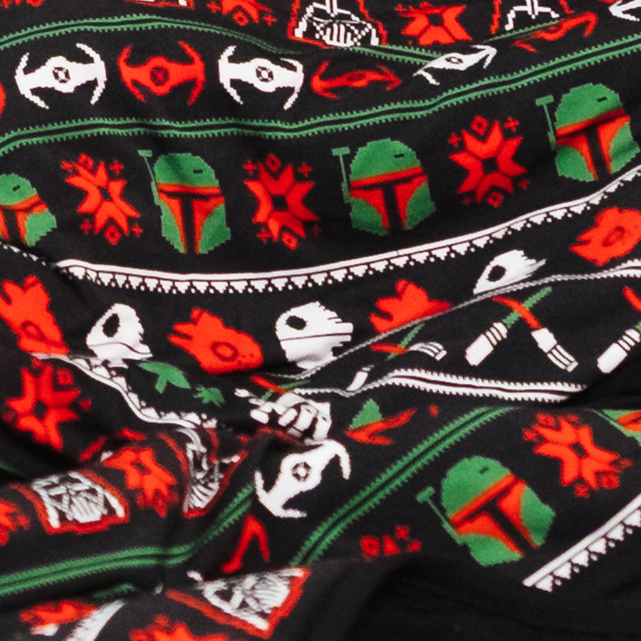 Close-up of the Merry Galaxy blanket's holiday sweater print