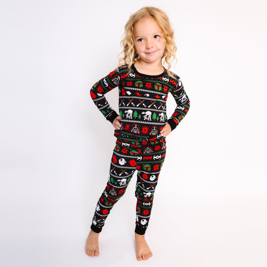 Girl standing in the Merry Galaxy long sleeve bamboo pajama set