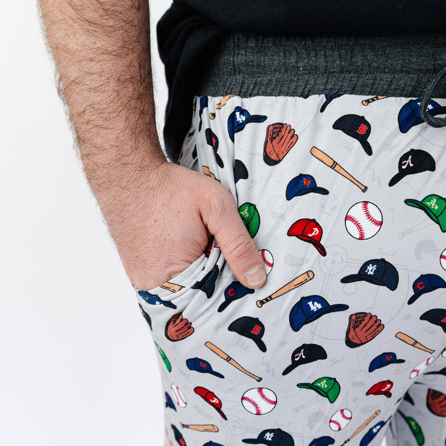 Close-up of a hand in the deep pocket of Major League Buddies men's bamboo pajama pants