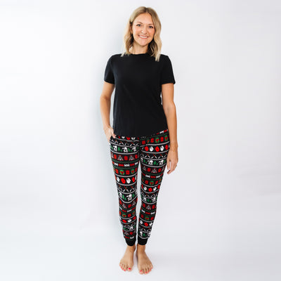 Woman wearing Merry Galaxy bamboo pajama pants with a black tee